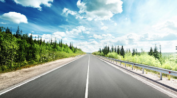 View of an open road vanishing into the distance